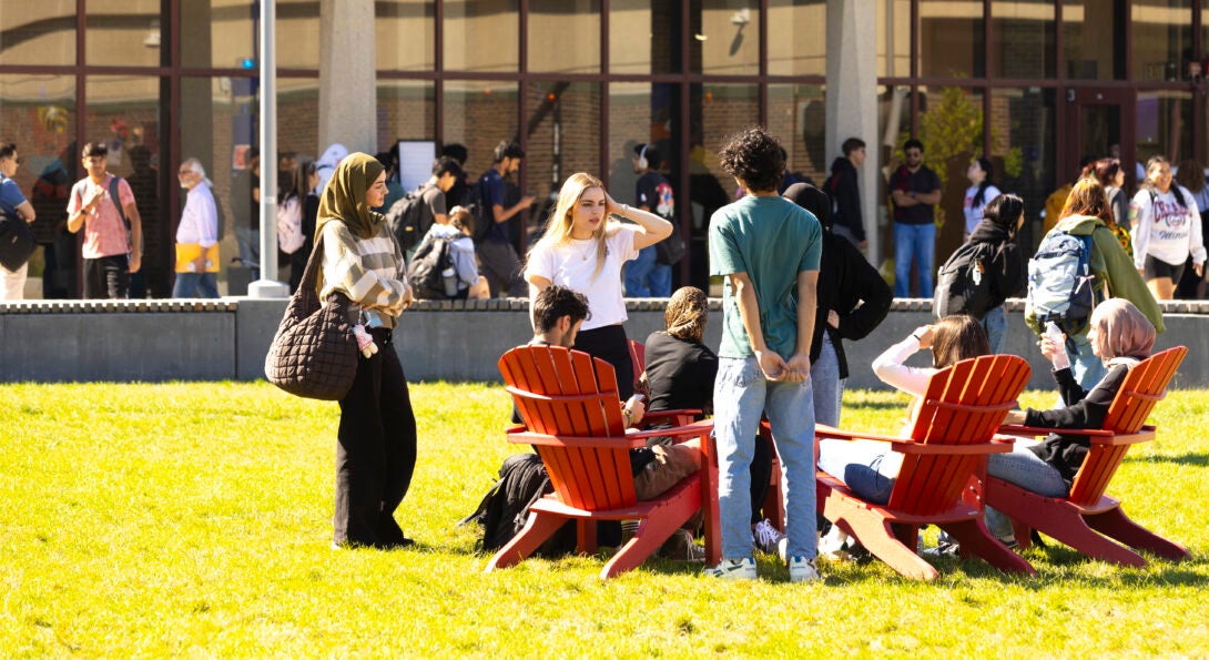 students sitting together on campus