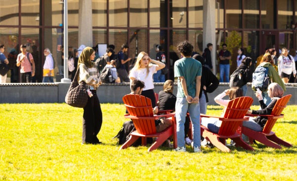 students sitting together on campus