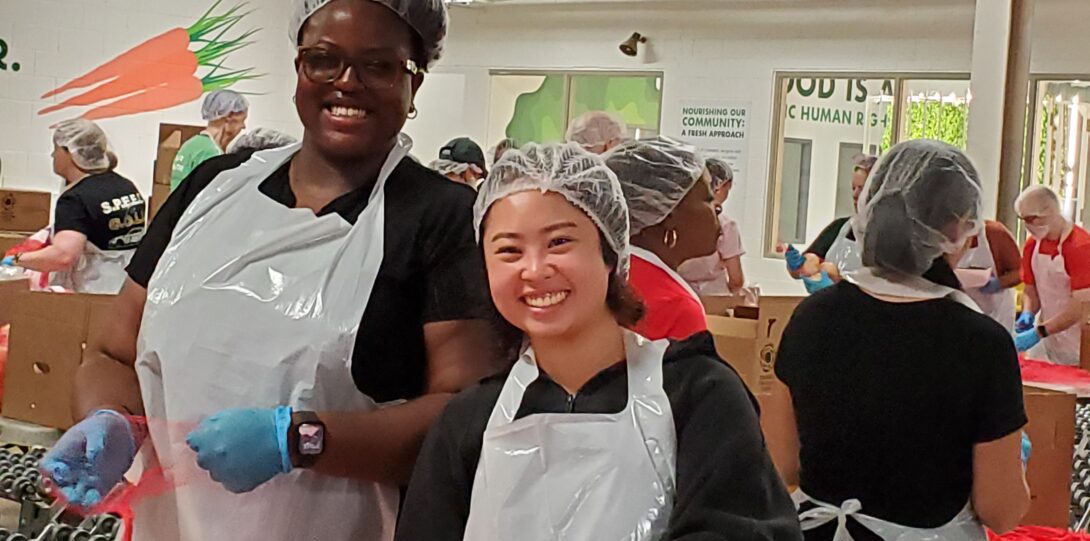UIC Employees smiling with onions