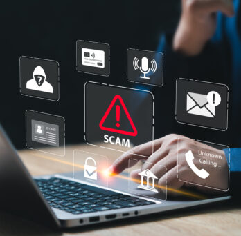 A hand clicking on the keyboard of a laptop and icons of phishing email scams
                  