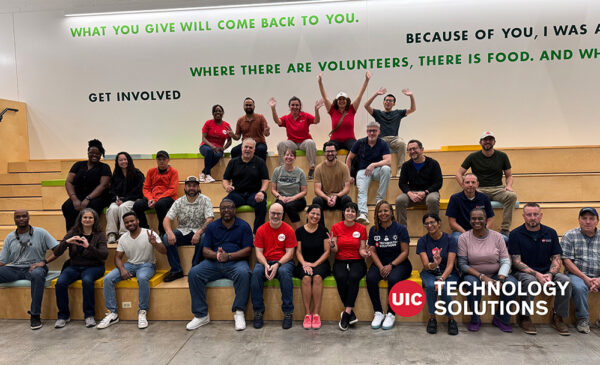Technology Solutions volunteers posing at Chicago Greater Food Depository