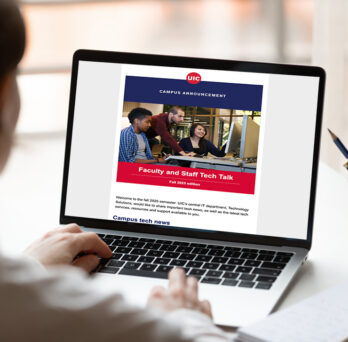 Person reading Fall tech talk newsletter on laptop
                  